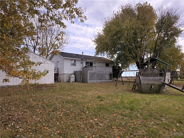 view of yard with a deck