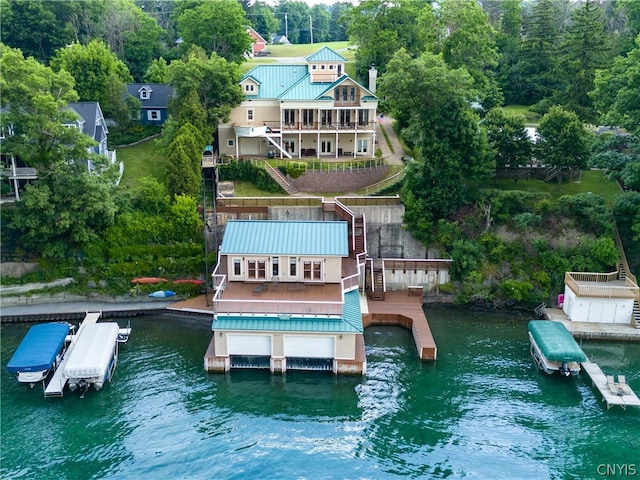 view of dock featuring a deck with water view