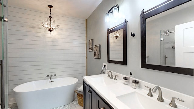 bathroom with wooden walls, a bathtub, and vanity