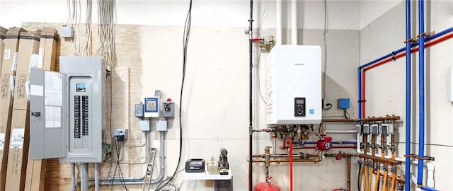 utility room with electric panel and water heater