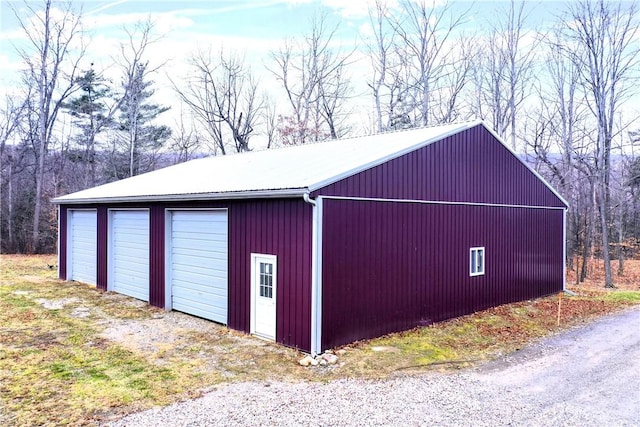 view of outbuilding featuring a garage