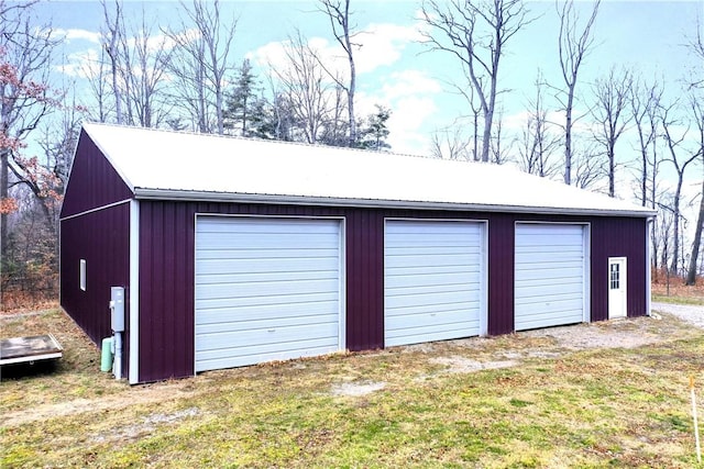 garage with a lawn