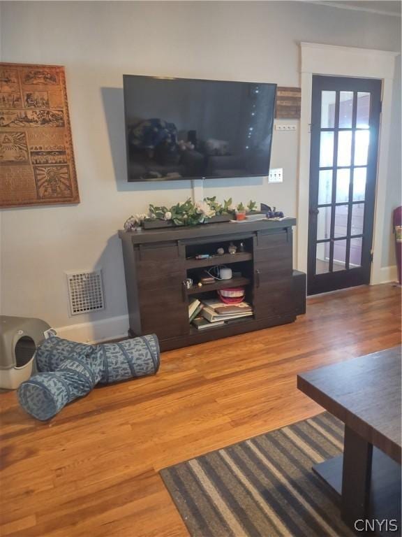 living room with wood-type flooring