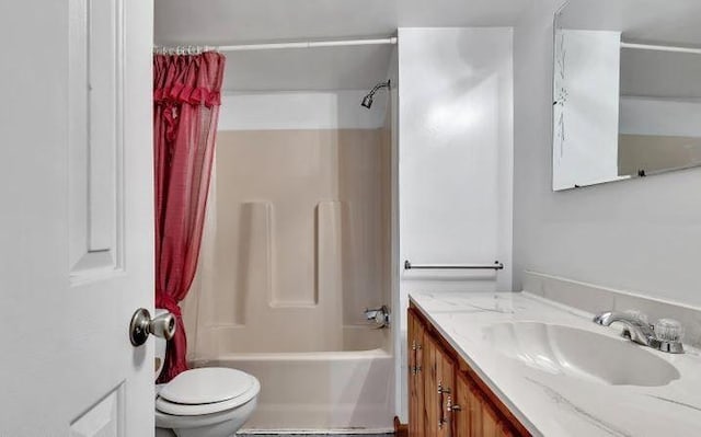 full bathroom featuring vanity, toilet, and bathing tub / shower combination