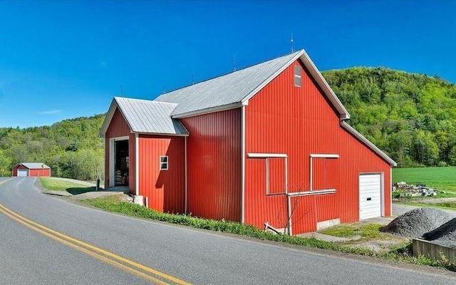 view of outbuilding with a garage