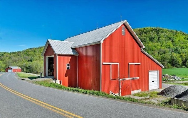 view of outbuilding with a garage