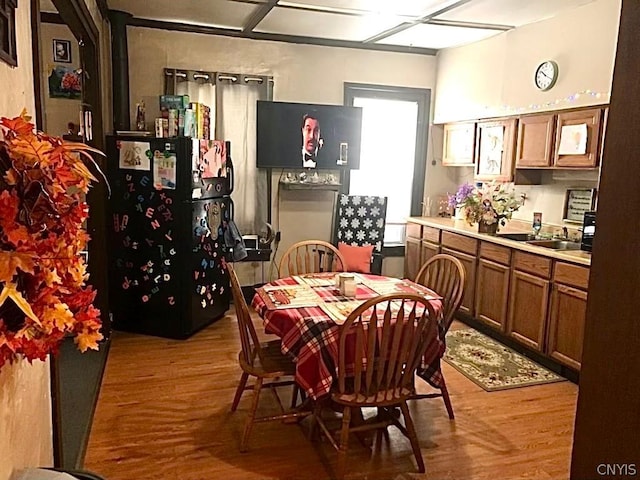 dining room with wood finished floors