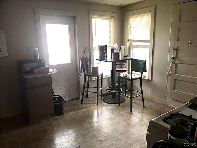 dining area with tile patterned floors