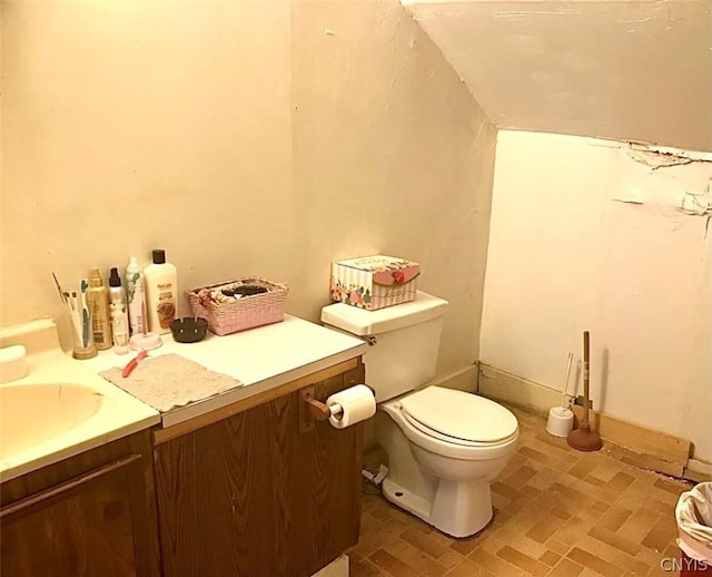 half bath with toilet and vanity