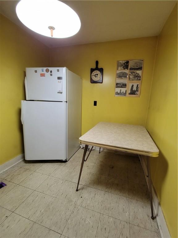 kitchen featuring white fridge