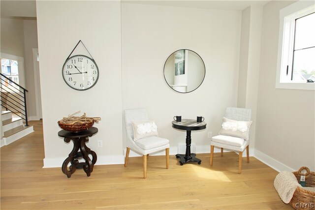 living area featuring light hardwood / wood-style floors