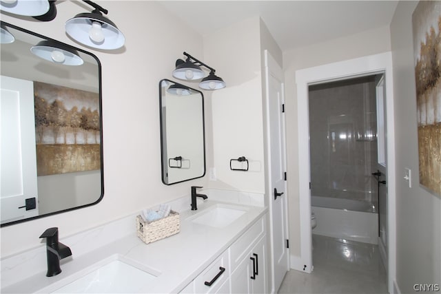 full bathroom with vanity, toilet, and  shower combination