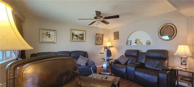 living room with ceiling fan and hardwood / wood-style flooring