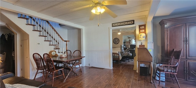 dining area featuring dark wood-type flooring, a textured ceiling, and ceiling fan