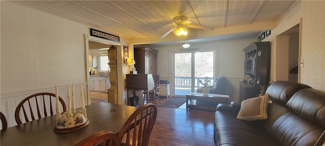 dining area with ceiling fan and hardwood / wood-style floors