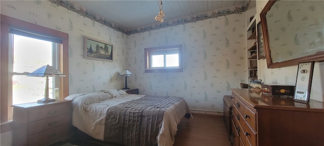 bedroom featuring dark hardwood / wood-style floors