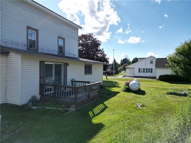 view of yard featuring a deck