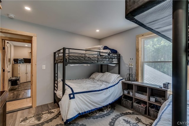 bedroom featuring hardwood / wood-style floors