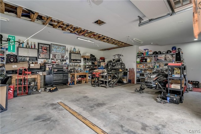 garage with a workshop area