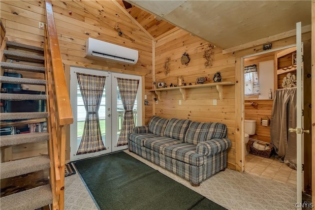 carpeted living room with french doors, vaulted ceiling, wooden ceiling, an AC wall unit, and wood walls