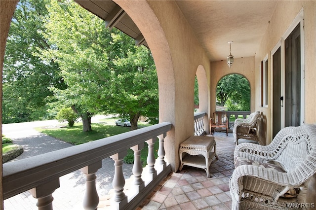 balcony featuring a porch