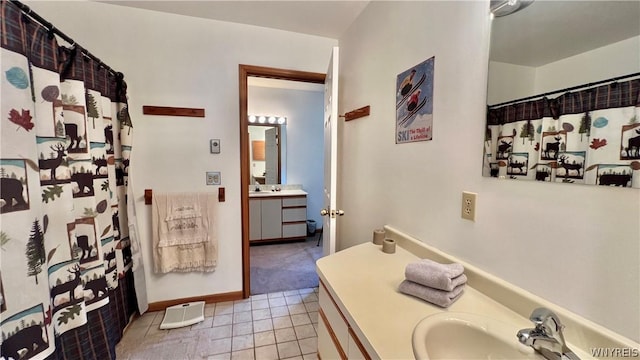 bathroom with vanity and tile patterned floors