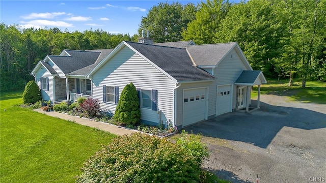 view of home's exterior with a yard and a garage