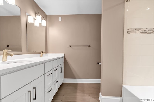 bathroom with tile patterned flooring and double sink vanity