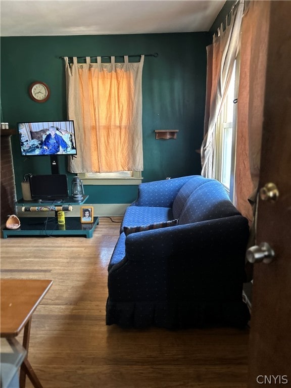 sitting room featuring hardwood / wood-style flooring