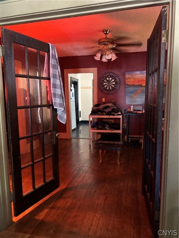 corridor with dark wood-type flooring