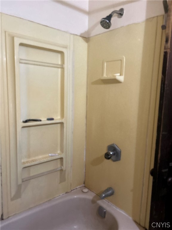 bathroom featuring washtub / shower combination