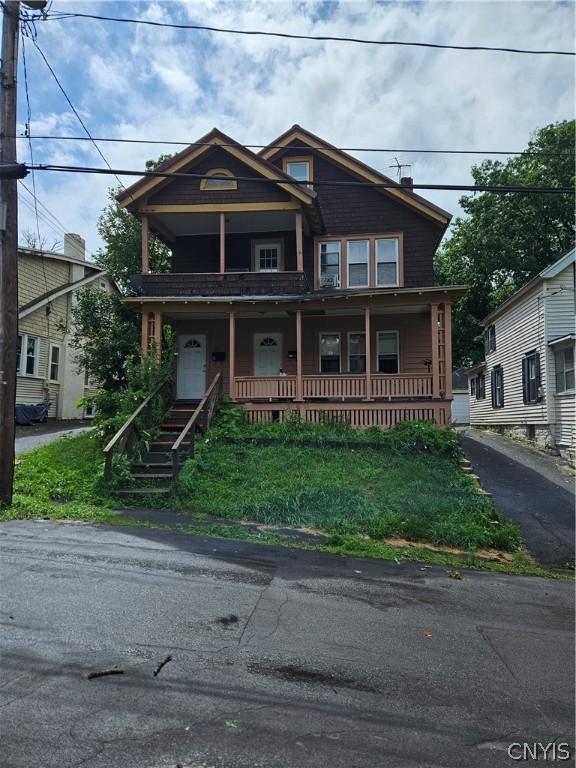 view of front of home featuring covered porch