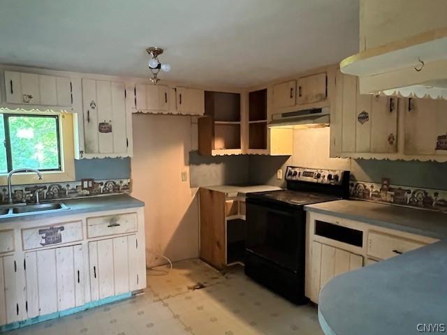 kitchen featuring electric range and sink