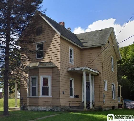 51 Fairmount Ave, Jamestown, NY 14701 - traditional-style house with a chimney and a front yard