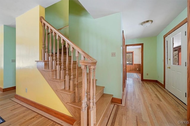 stairs with wood-type flooring