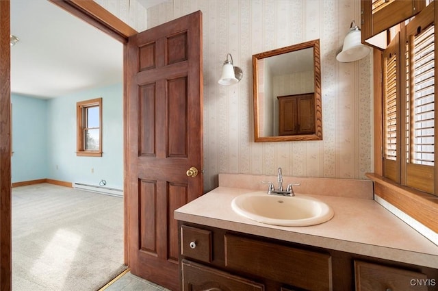 bathroom featuring vanity and a baseboard radiator