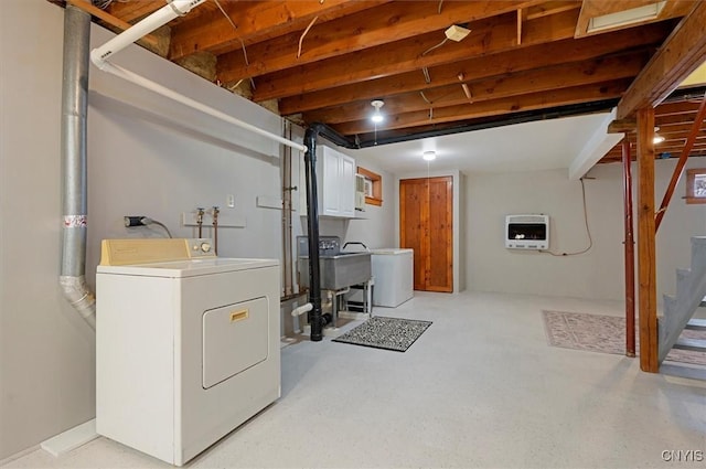 basement with washer / clothes dryer and heating unit