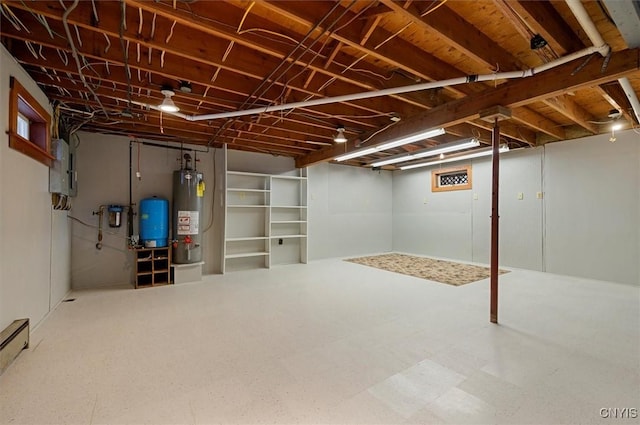 basement with water heater and electric panel