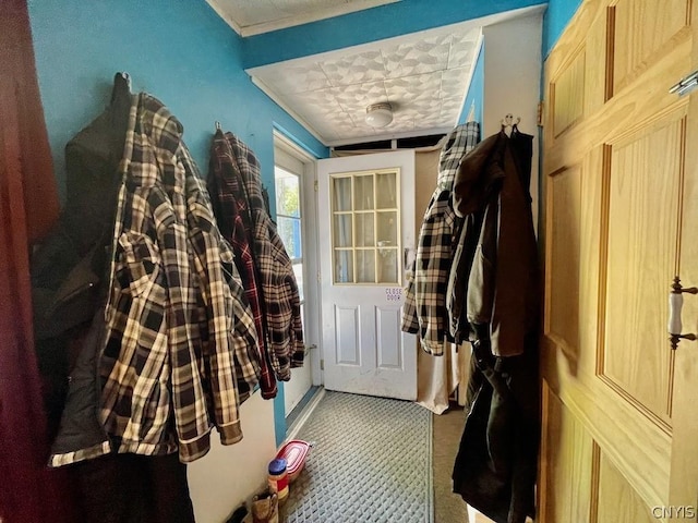 mudroom featuring crown molding