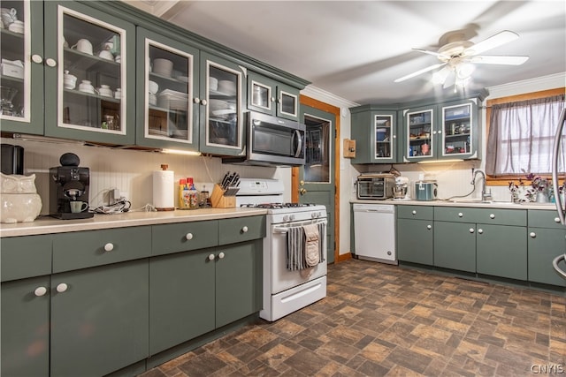 kitchen with ornamental molding, tasteful backsplash, ceiling fan, and white appliances