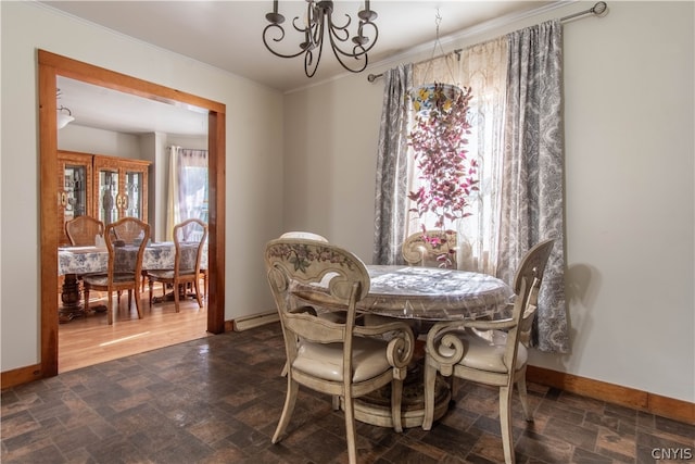 dining room featuring a chandelier and wood-type flooring