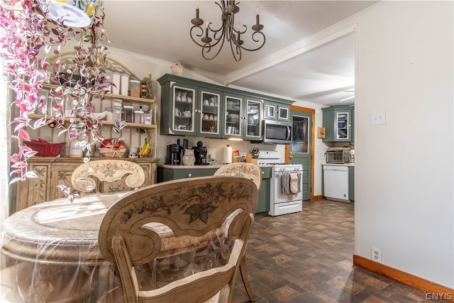 dining area featuring ornamental molding and an inviting chandelier