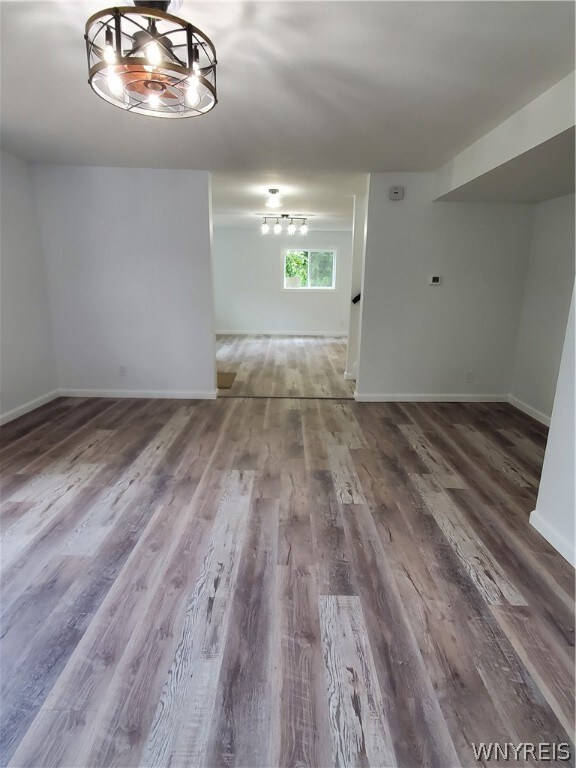 empty room featuring hardwood / wood-style flooring