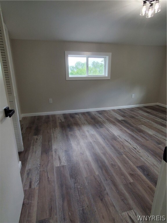 unfurnished room featuring hardwood / wood-style floors