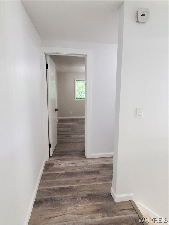 hall featuring dark hardwood / wood-style floors