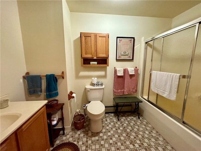 full bathroom featuring tile patterned floors, toilet, shower / bath combination with glass door, and vanity