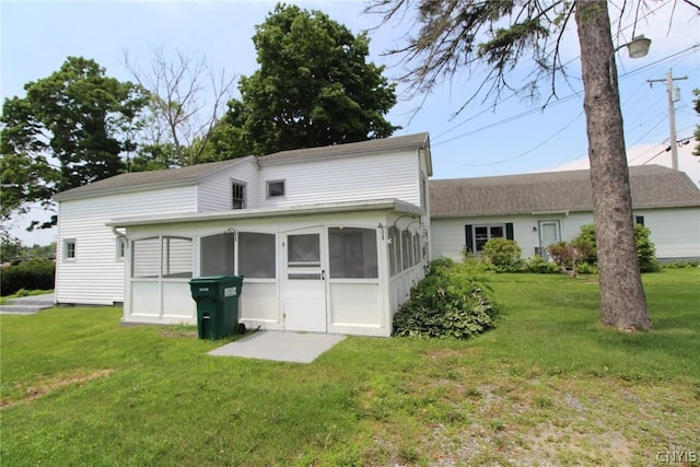 850 County Route 37, Hastings, NY 13036 - back of house featuring a sunroom and a yard