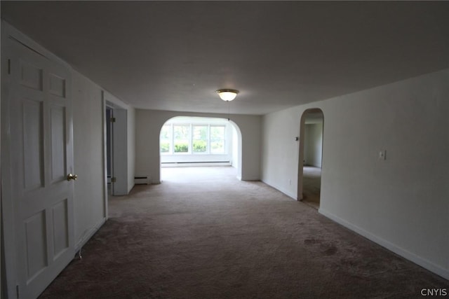 850 County Route 37, Hastings, NY 13036 - hallway featuring arched walkways, baseboard heating, carpet, and baseboards
