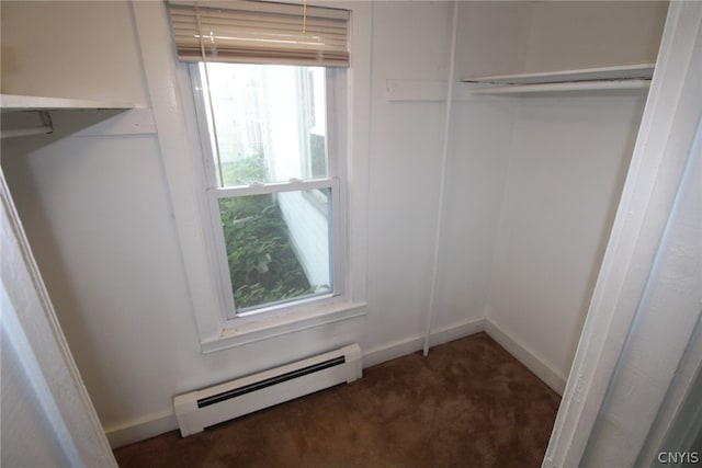 closet featuring a baseboard heating unit