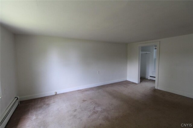 850 County Route 37, Hastings, NY 13036 - empty room featuring a baseboard heating unit, carpet, and baseboards